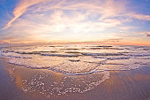 Sunset waves at the shoreline, Tampa, Florida.