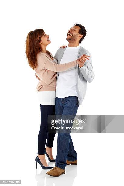glückliche ältere paar tanzen zusammen - romantic couple on white background stock-fotos und bilder