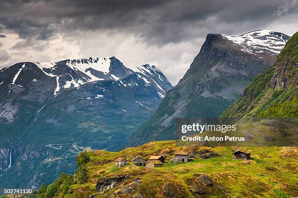 old village on a background of mountains, norway - more og romsdal bildbanksfoton och bilder