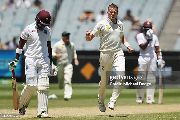 Peter Siddle of Australia celebrates his wicket of Darren Bravo of the West Indies during day four of the Second Test match between Australia and the...