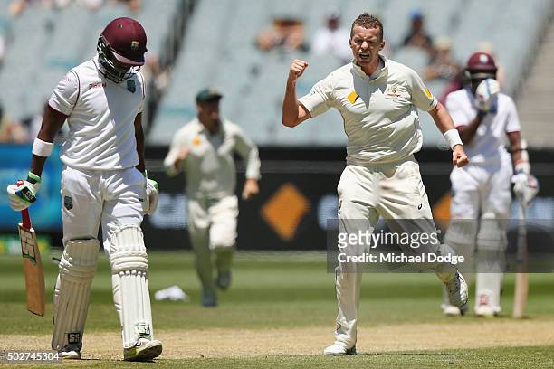 Peter Siddle of Australia celebrates his wicket of Darren Bravo of the West Indies during day four of the Second Test match between Australia and the...