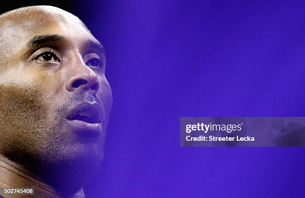Kobe Bryant of the Los Angeles Lakers watches on before their game against the Charlotte Hornets at Time Warner Cable Arena on December 28, 2015 in...