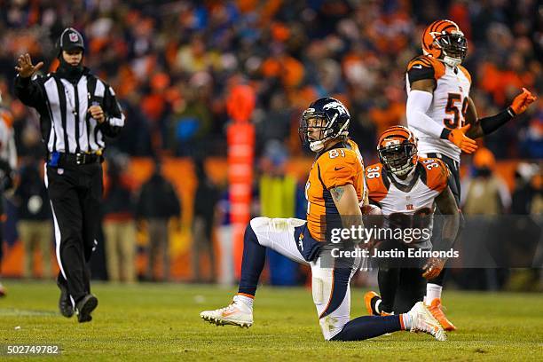 Tight end Owen Daniels of the Denver Broncos reacts after making a 26 yard reception for a first down against cornerback Shawn Williams of the...