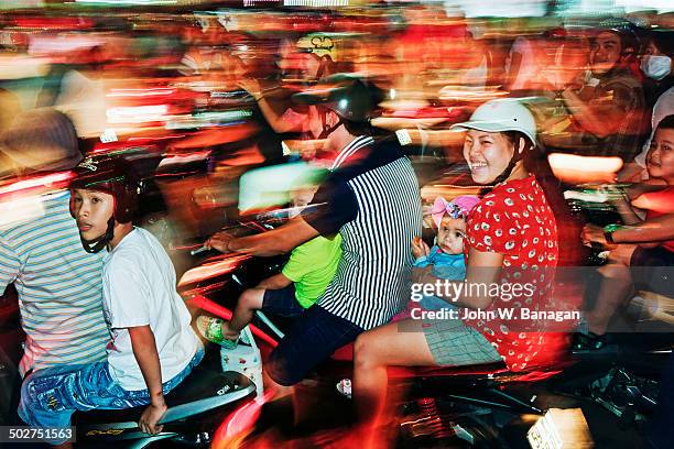 motorbikes at xmas, saigon, hcm city - baby sturzhelm stock-fotos und bilder