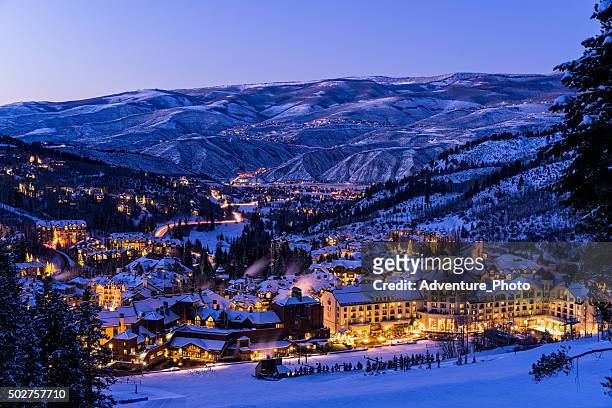 beaver creek resort winter skiing at dusk - colorado stock pictures, royalty-free photos & images