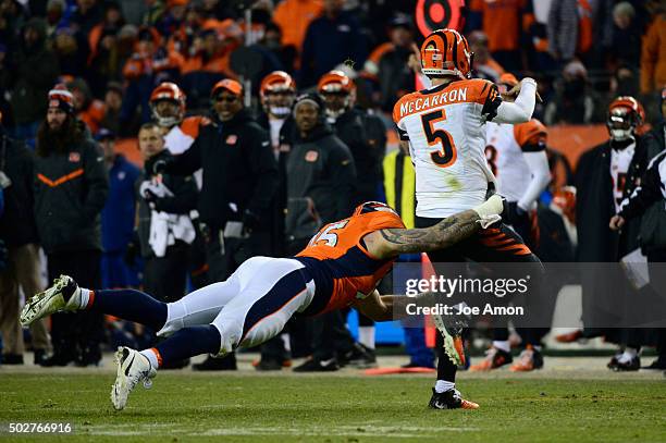 Derek Wolfe of the Denver Broncos chases down AJ McCarron of the Cincinnati Bengals forcing him to throw out of bounds in the fourth quarter. The...