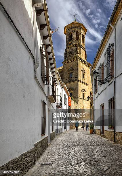 conde romanones street, in background old university building, baeza jaen province, andalucia, spain - jaén city stock pictures, royalty-free photos & images