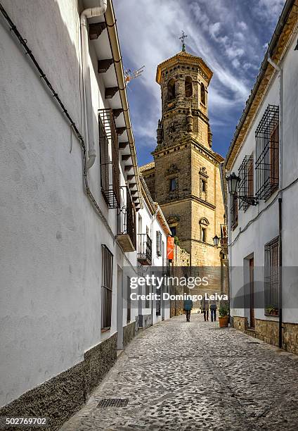 conde romanones street, in background old university building, baeza jaen province, andalucia, spain - baeza stock pictures, royalty-free photos & images