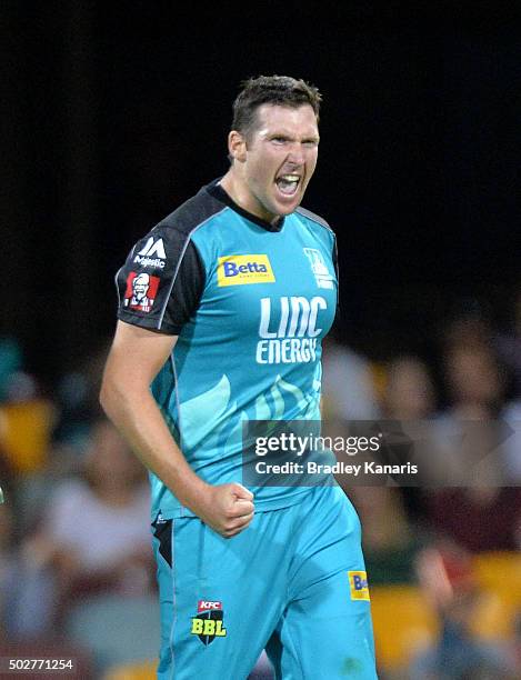 Luke Feldman of the Heat celebrates after taking the wicket of Kumar Sangakkara of the Hurricanes during the Big Bash League match between the...