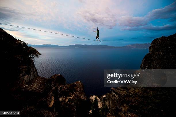 above all - slacklining stock pictures, royalty-free photos & images