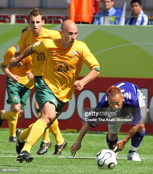 Marco Bresciano of Australia and Hidetoshi Nakata of Japan compete for the ball during the FIFA World Cup Germany 2006 Group F match between...