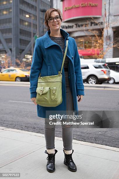 Tori Crosby is seen on Michigan Avenue wearing a blue wool Pendleton coat and grey poly blend Forever 21 sweater on December 12, 2015 in Chicago,...