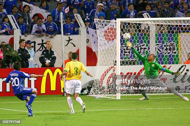 Keiji Tamada of Japan scores his team's first goal during the FIFA World Cup Germany 2006 Group F match between Japan and Brazil at the Stadium...
