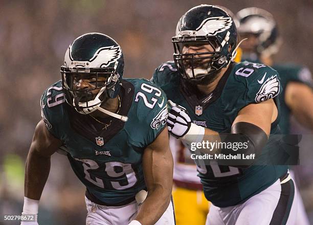 DeMarco Murray and Jason Kelce of the Philadelphia Eagles react after a touchdown against the Washington Redskins on December 26, 2015 at Lincoln...