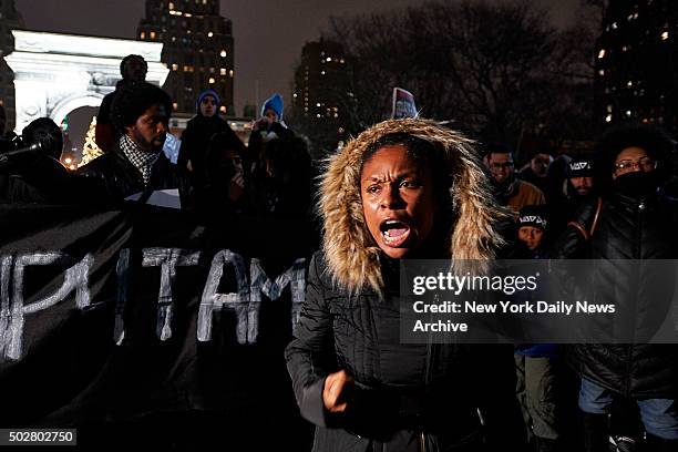 People gather during a vigil for police shooting victim Tamir Rice at Washington Square Park on Monday, December 28, 2015 in New York, N.Y....