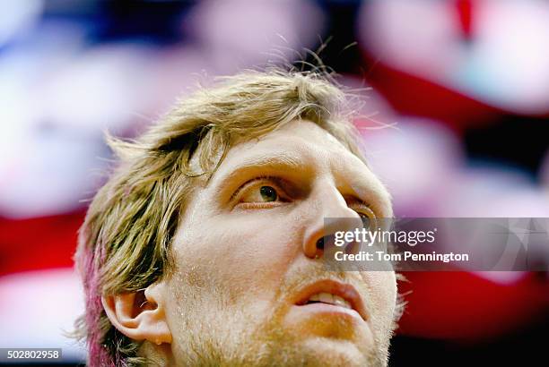 Dirk Nowitzki of the Dallas Mavericks stands during the National Anthem before taking on the Milwaukee Bucks at American Airlines Center on December...