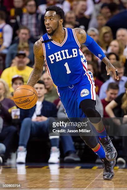 Tony Wroten of the Philadelphia 76ers drives the ball down court during the first half against the Cleveland Cavaliers at Quicken Loans Arena on...