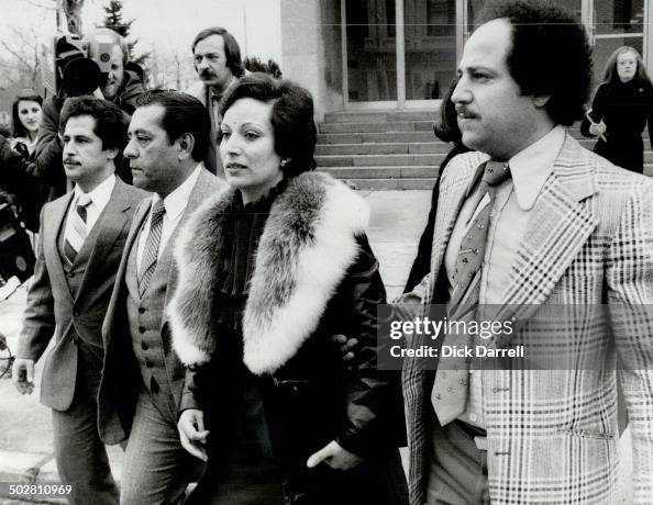 Ordeal over: Dunia Sayegh; 28; leaves courthouse with her brother; Yasser Eid; right; her husband; R Ordeal over: Dunia Sayegh; 28; leaves courthouse with her brother; Yasser Eid; right; her husband; R