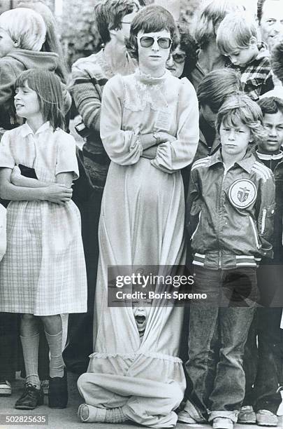 Cool morning and a shivering crowd greeted the Queen in Grande Prairie; Alta.; where she turned the sod for a new hospital complex. Lisa Hennigar; 6;...