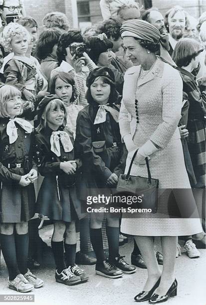 Queen Elizabeth talks to Brownies at sod-turning ceremony in Grande Prairie; Alta. One reader says majority oppose visit. Others criticize Prime...