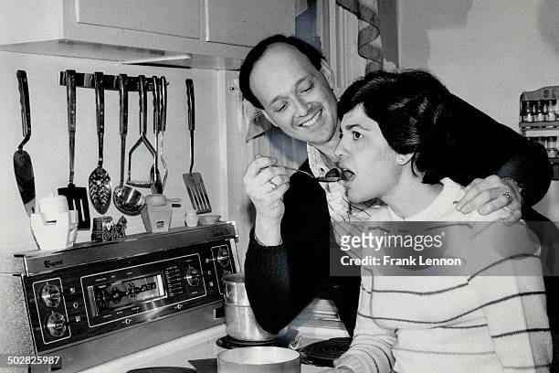 Maltese-born Richard Cumbo; an information clerk for the Rent Review Board; serves wife Madlene some inbuljuta; a Maltese hot toddy made from...