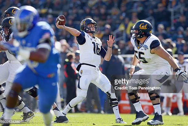 Jared Goff of the California Golden Bears looks for an open receiver against the Air Force Falcons in the first quarter at Amon G. Carter Stadium on...