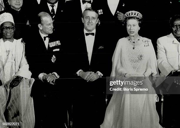 Commonwealth portrait: Prime Minister Brian Mulroney is flanked by the Queen and Prince Philip while posing for a group photo in Vancouver last night...