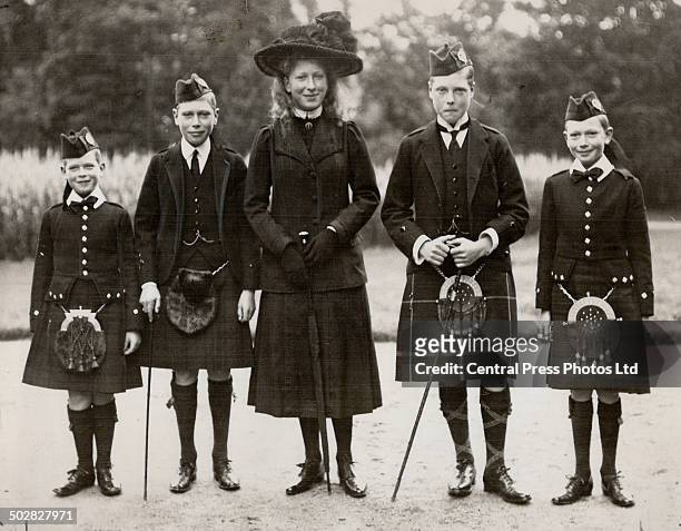 This picture was taken in 1912 when the duke-christened Prince George Edward Alexander Edmund - was nine years old. Left to right are shown Prince...
