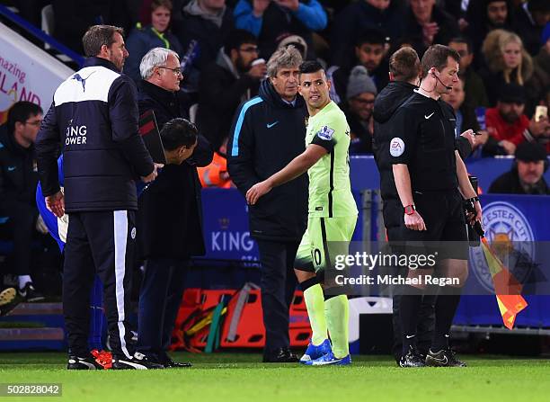 Sergio Aguero of Manchester City reacts as he is substituted as Manuel Pellegrini manager of Manchester City looks on during the Barclays Premier...