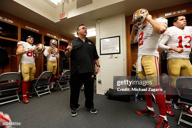 Head Coach Jim Tomsula of the San Francisco 49ers addresses the team in the locker room prior to the game against the Detroit Lions at Ford Field on...