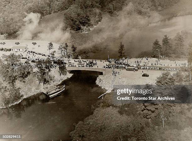 While guns roared a salute Mr. Roosevelt and Mr. King opened the Thousand Islands bridge system on this 90-foot span through which the boundary passes