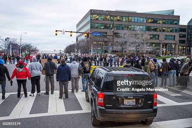 Demonstrators block traffic at the intersection of Lakeside and E.9th St. On December 29, 2015 in Cleveland, Ohio. Protestors took to the street the...