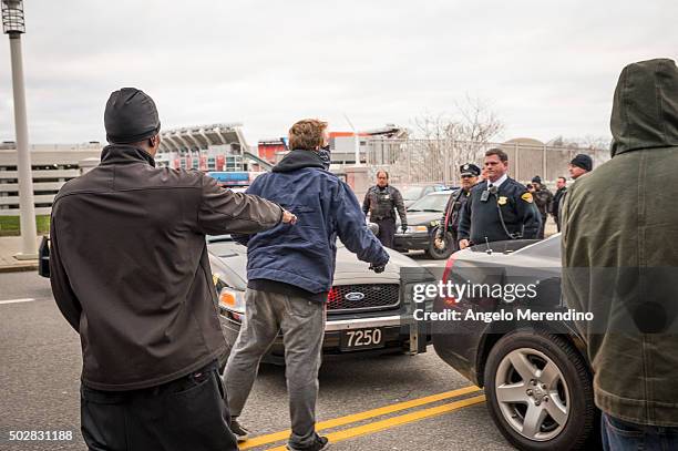 An unidentified young male confronts a police officer on E.9th St. On December 29, 2015 in Cleveland, Ohio. Protestors took to the street the day...