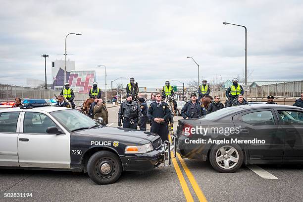 Members of the Cleveland Police Department form a roadblock on E. 9th St. On December 29, 2015 in Cleveland, Ohio. Protestors took to the street the...