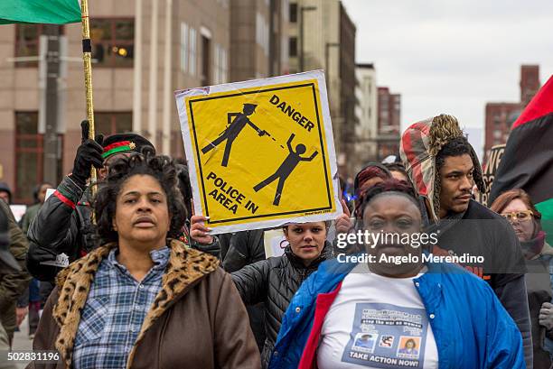 Katy Kostenko , a 19-year old resident of Cleveland, marches with other activists on St Clair Ave. On December 29, 2015 in Cleveland, Ohio....