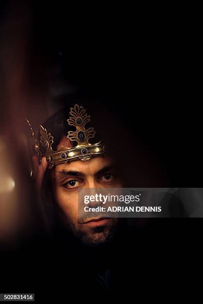 Actor Alex Hassell poses for a photograph in his dressing room at The Barbican Theatre in London on November 10, 2015. Britain's Royal Shakespeare...