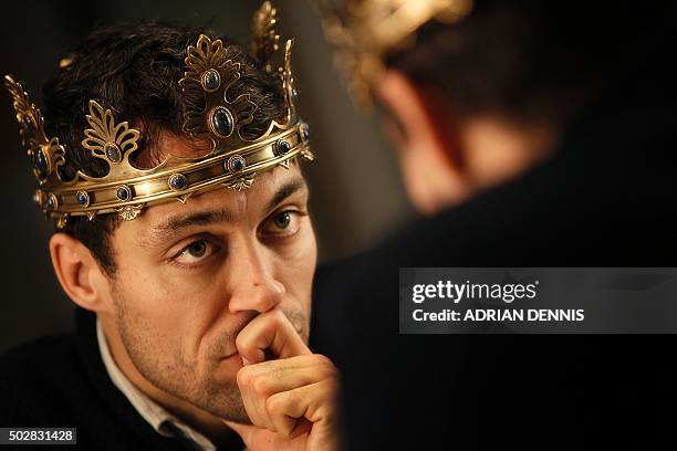 Actor Alex Hassell poses for a photograph in his dressing room at The Barbican Theatre in London on November 10, 2015. Britain's Royal Shakespeare...