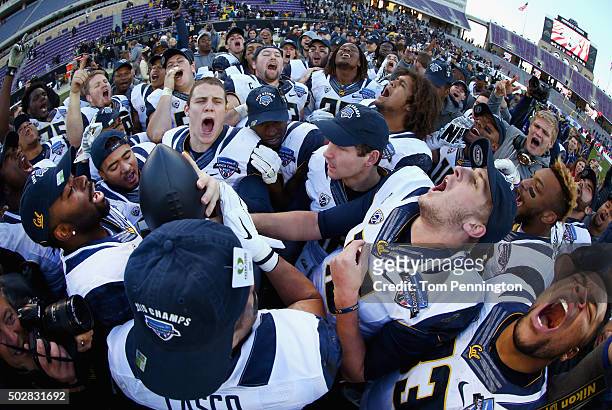 Daniel Lasco of the California Golden Bears and Jared Goff of the California Golden Bears celebrate with the championship trophy after beating the...