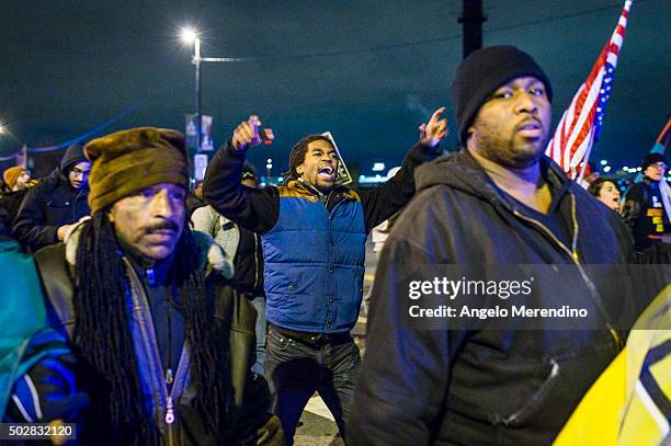 Demonstrators march on Ontario St. On December 29, 2015 in Cleveland, Ohio. Protestors took to the street the day after a grand jury declined to...