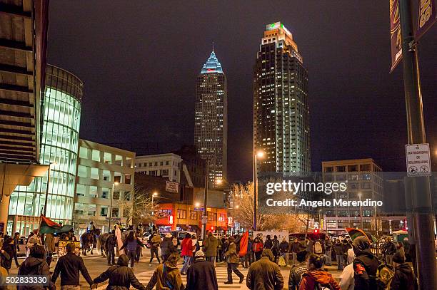 Demonstrators block traffic in front of The Quicken Loans Arena on December 29, 2015 in Cleveland, Ohio. Protestors took to the street the day after...