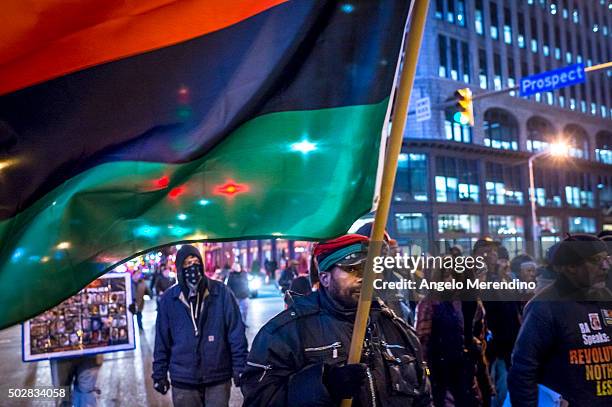 Demonstrators block traffic as they march through the intersection of Prospect and E. 9th St. On December 29, 2015 in Cleveland, Ohio. Protestors...