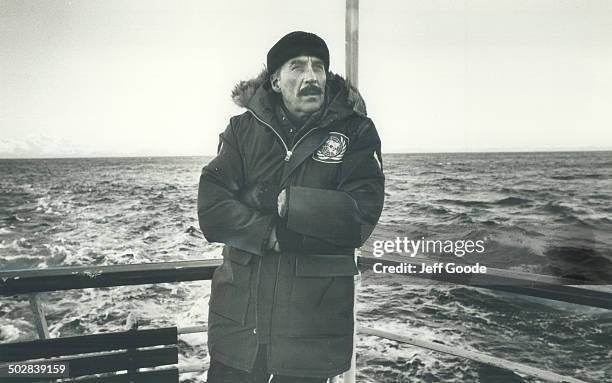 Christopher Lee bundles up on Russian liner while filming Bear Island in Alaska. He plays a meteorologist.