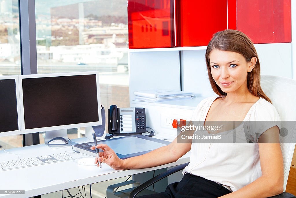 Businesswoman at desk in the office