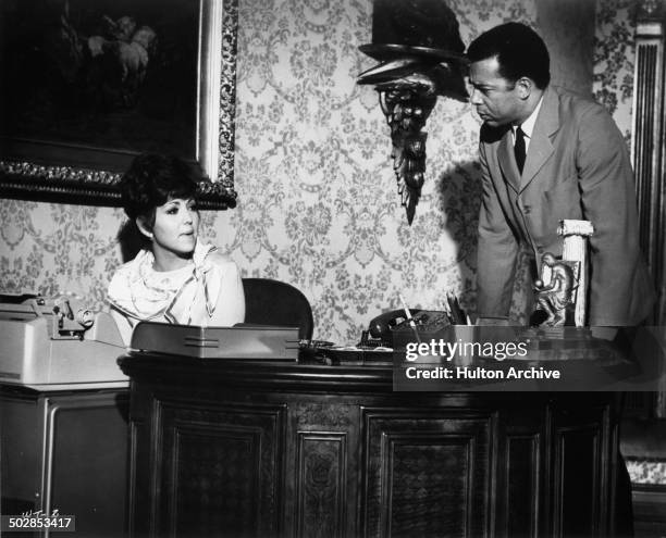 Brenda Vaccaro gives instructions to Vince Howard in a scene for the United Artist movie "Where It's At" circa 1968.