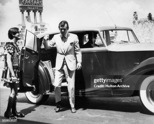 David Janssen gets out of his Rolls Royce in a scene for the United Artist movie "Where It's At" circa 1968.
