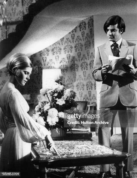 Robert Drivas talks with Rosemary Forsyth in a scene for the United Artist movie "Where It's At" circa 1968.