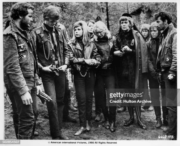 Peter Fonda, Nancy Sinatra, Diane Ladd, Joan Shawlee and Norman Alden stand in a group in a scene from the movie "The Wild Angels" circa 1966.