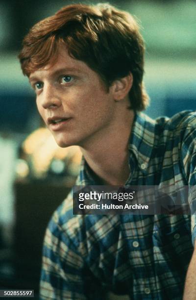 Eric Stoltz looks on in a scene for the Universal Studios movie "The Wild Life" circa 1984.