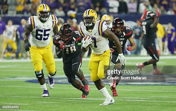 Leonard Fournette of the LSU Tigers runs for a 43-yard touchdown during the second half of their game against the Texas Tech Red Raiders during the...