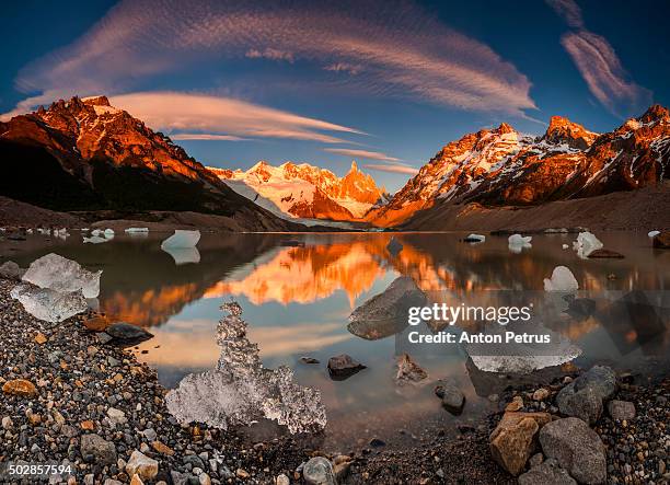 panorama of sunrise at cerro torre with ice floes - patagonia fotografías e imágenes de stock